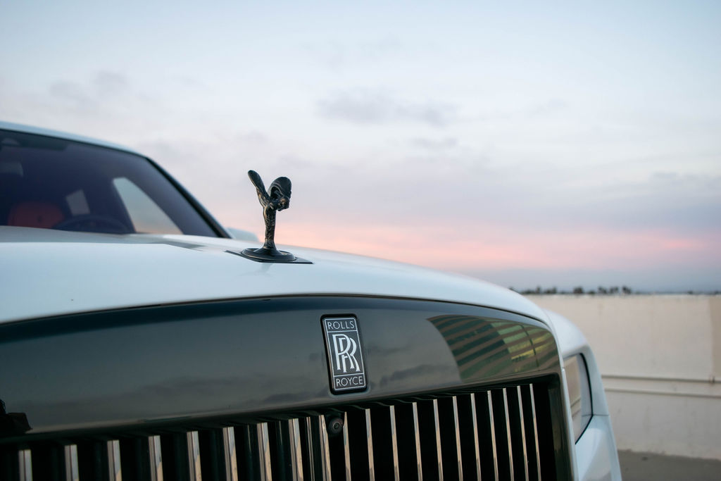 White Rolls Royce Cullinan rental, a V12 SUV with a 155 mph top speed