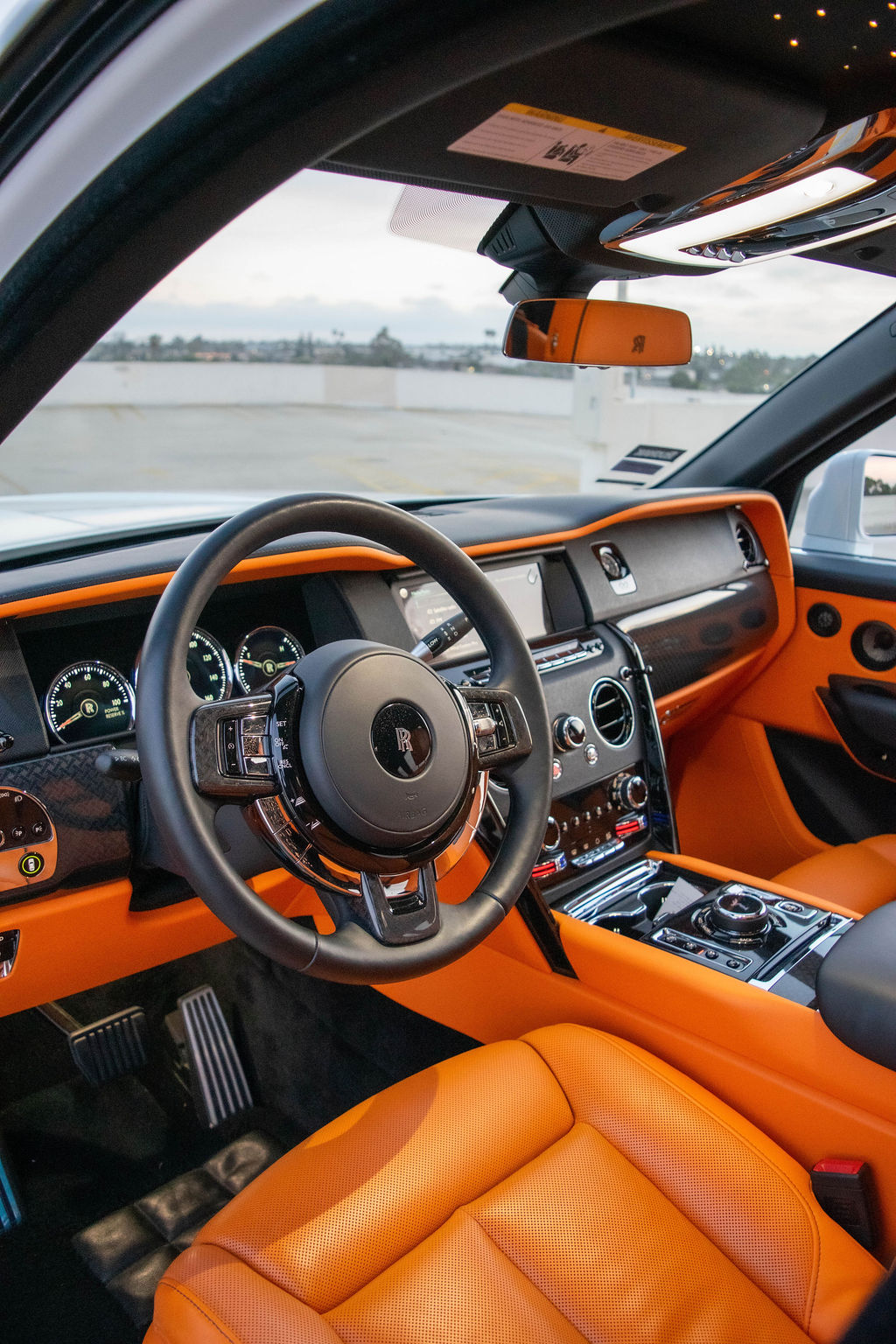 Rolls Royce Cullinan rental, a 4 door V12 SUV with rear-wheel steering