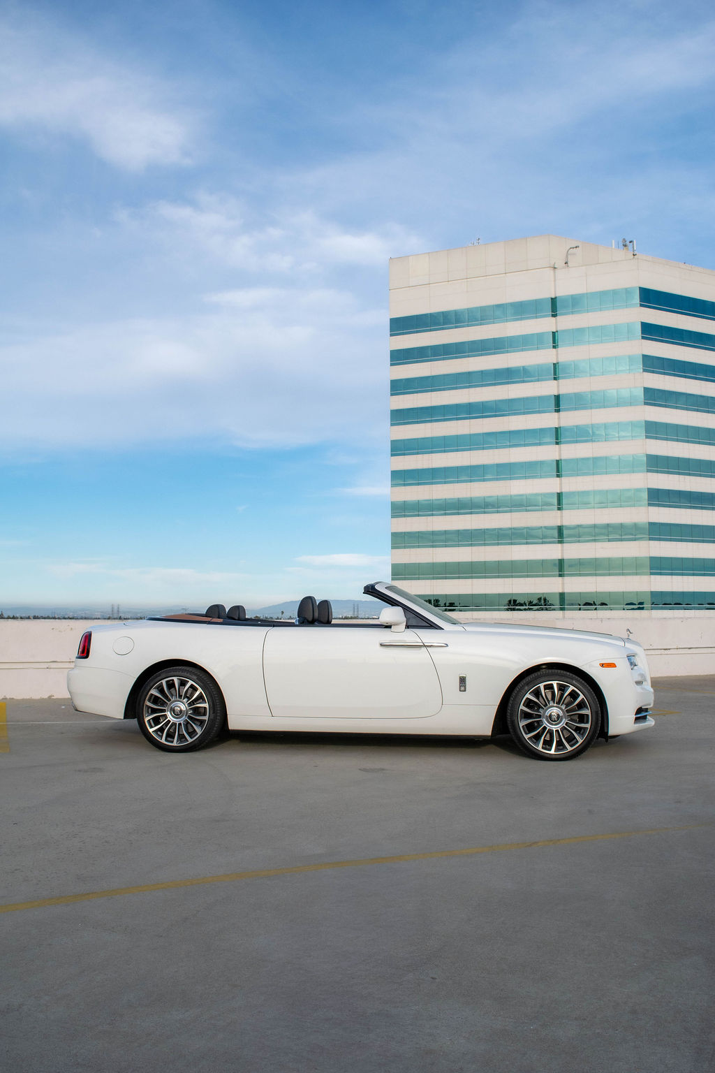Rolls Royce Dawn rental, a V12 convertible available across Southern California
