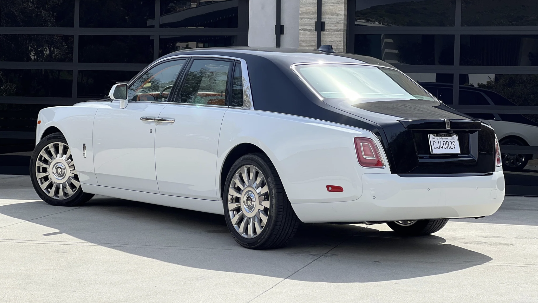 Rolls Royce Phantom rental, a 563 hp twin-turbo V12 sedan in white
