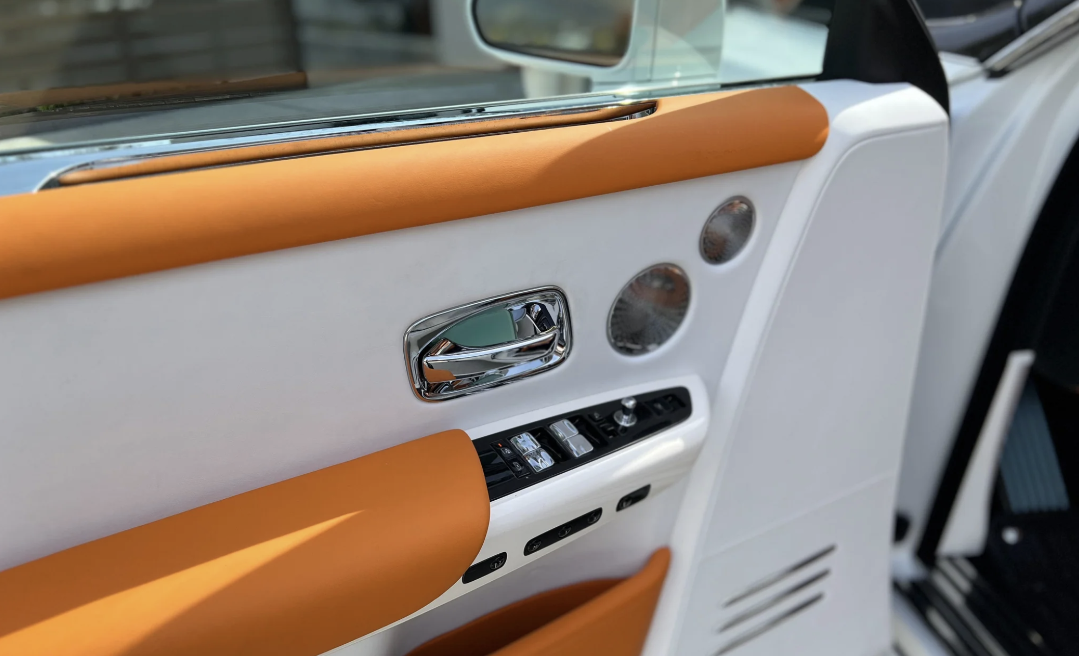 White Rolls Royce Phantom rental, a V12 sedan with a 155 mph top speed