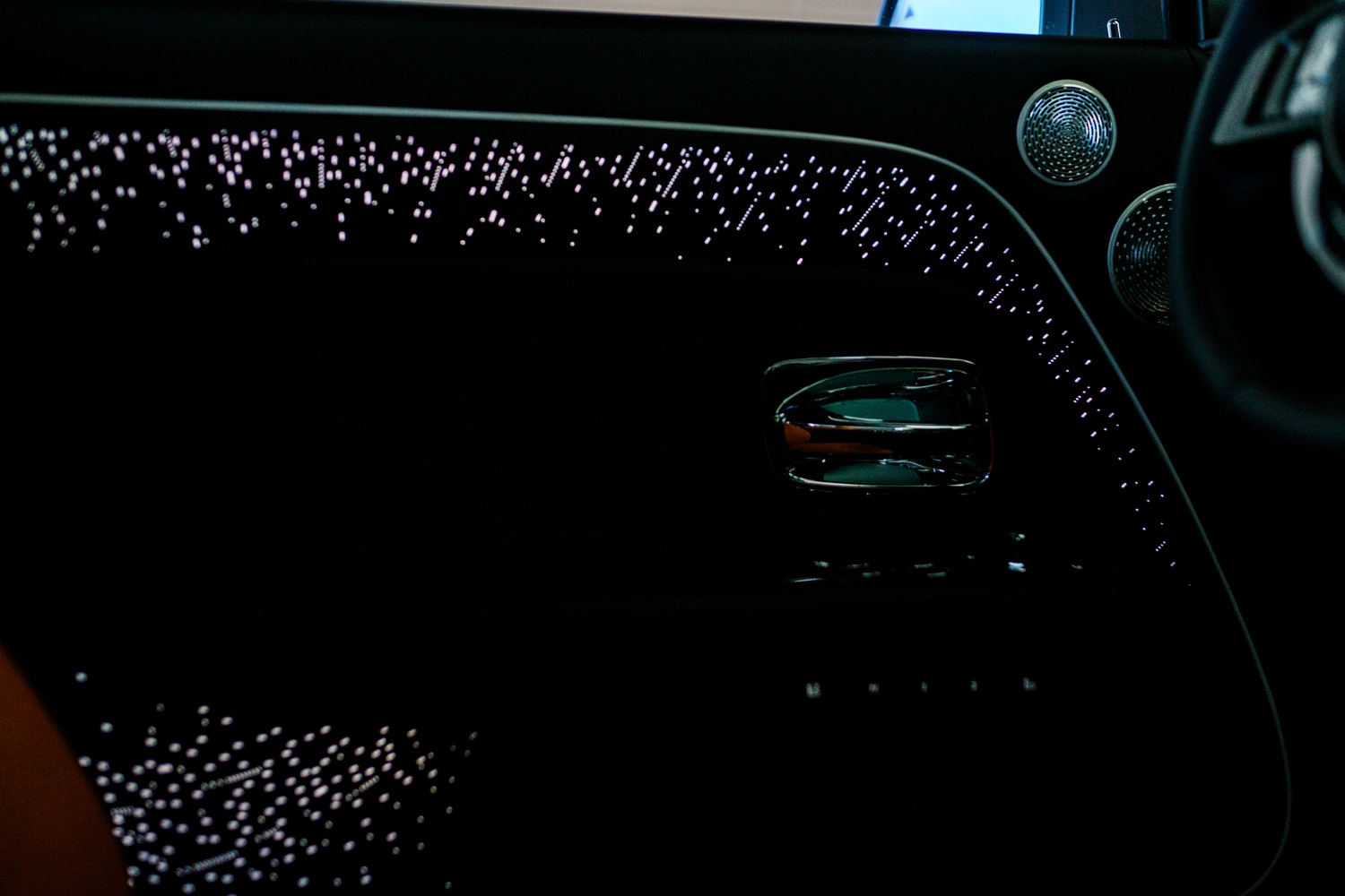 Interior of the grey Rolls Royce Spectre rental, a 4 seat electric coupe
