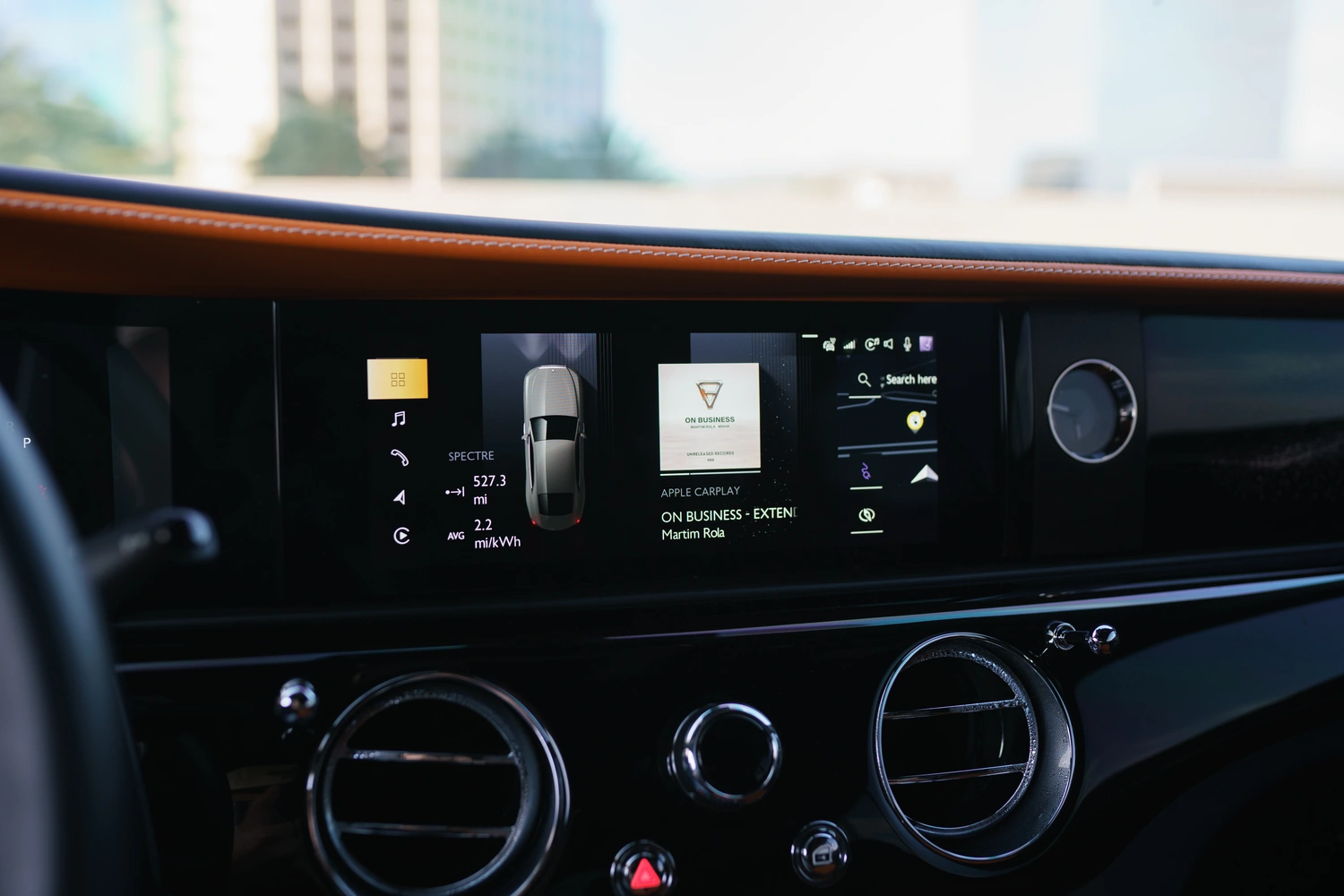 Interior of the Rolls Royce Spectre rental, a 102 kWh electric coupe rated at 260 miles