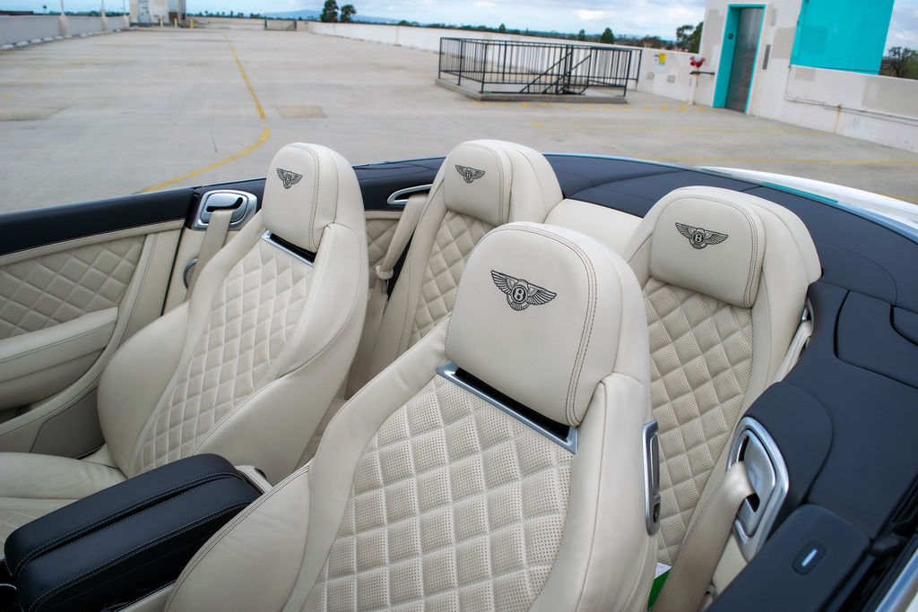 White Bentley Continental GTC rental, a 500 hp twin-turbo V8 convertible