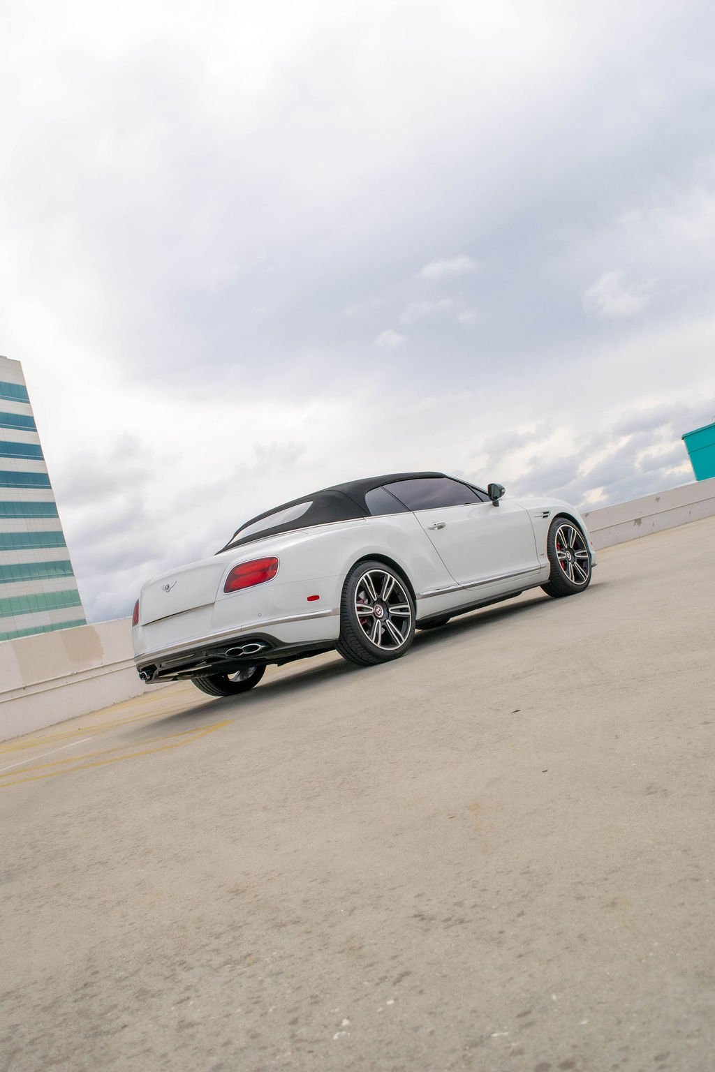 Bentley Continental GTC rental in white, a grand tourer with a 192 mph top speed