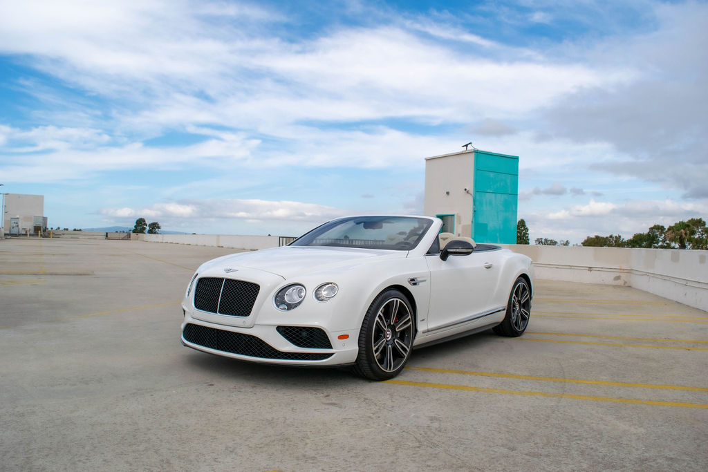 Bentley Continental GTC rental in white, an eight-speed automatic grand tourer