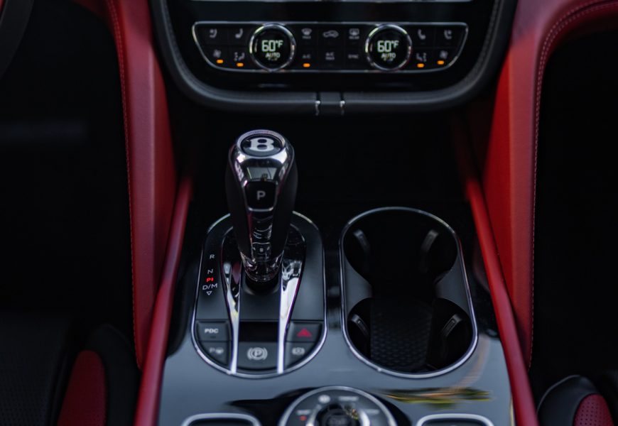 Center console in the Bentley Bentayga S rental, trimmed in Alcantara and carbon fiber