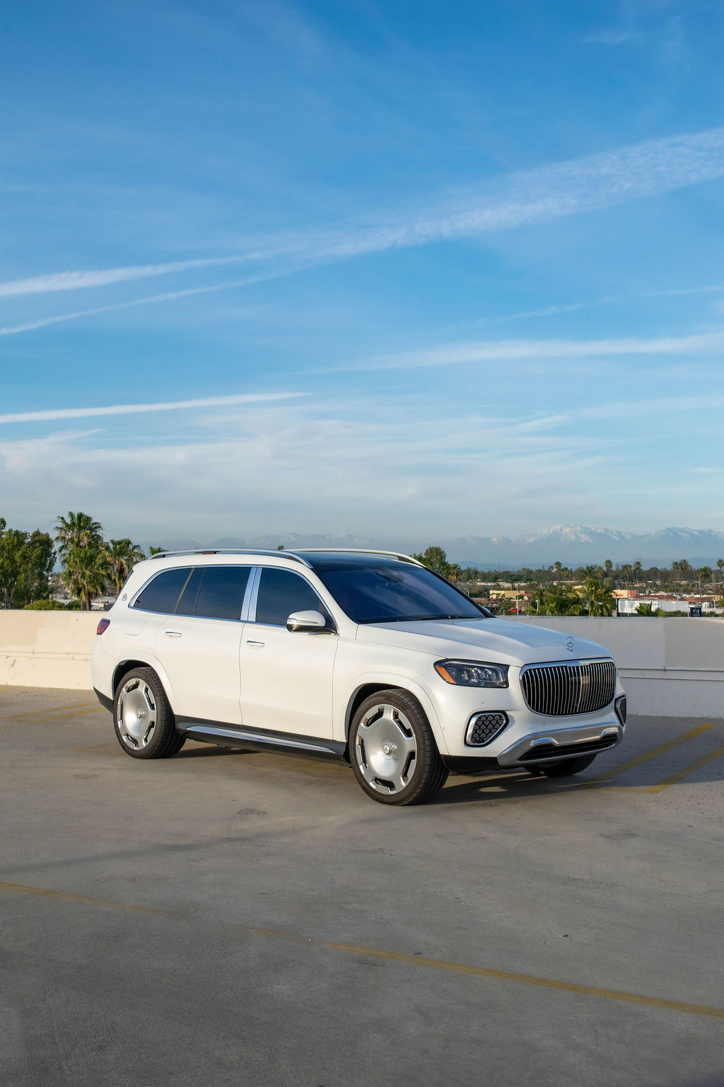 Maybach GLS 600 rental in white, a mild hybrid V8 luxury SUV