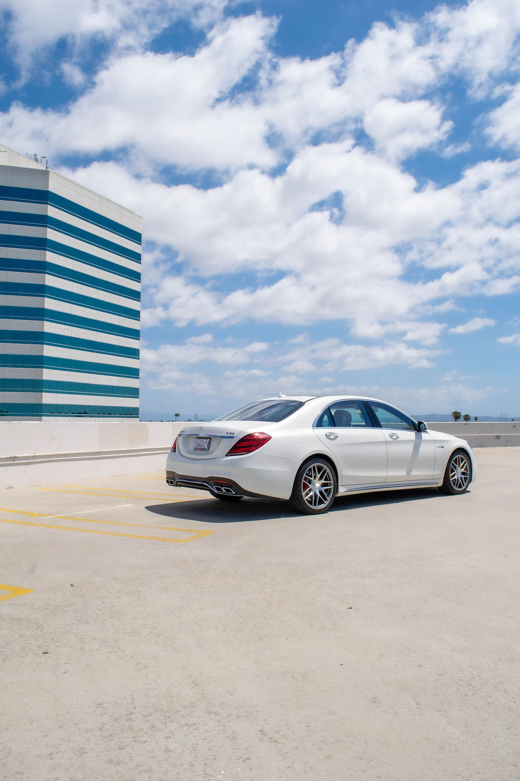 Mercedes-Benz S-Class rental in white, a 4.0 liter twin-turbo V8 on air suspension