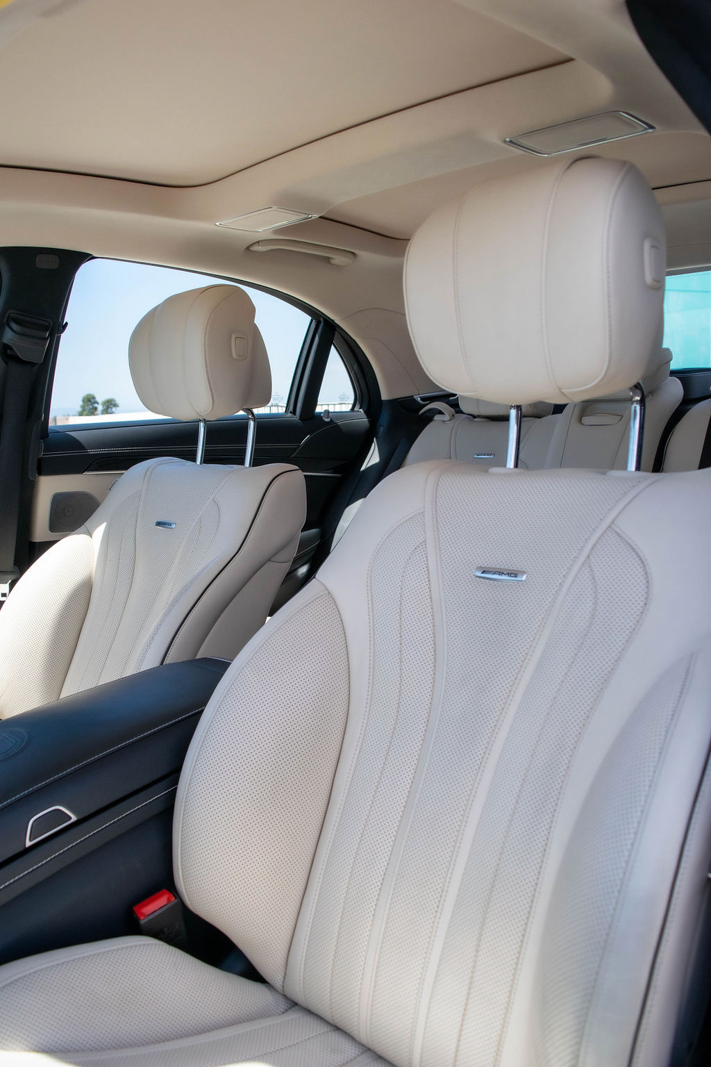 Mercedes-Benz S-Class rental in white, reaching 60 mph in 3.4 seconds