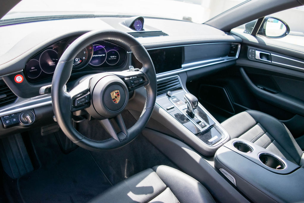 Porsche Panamera rental in black, with 46 cubic feet behind the folded rear seats