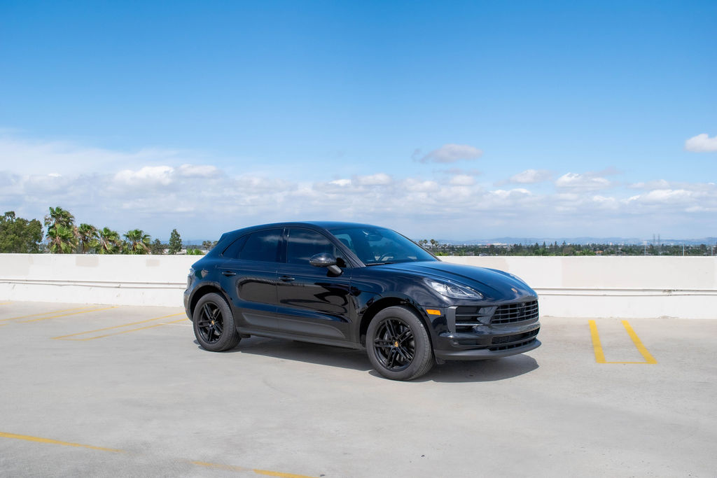 Black Porsche Macan rental in Orange County, Black interior