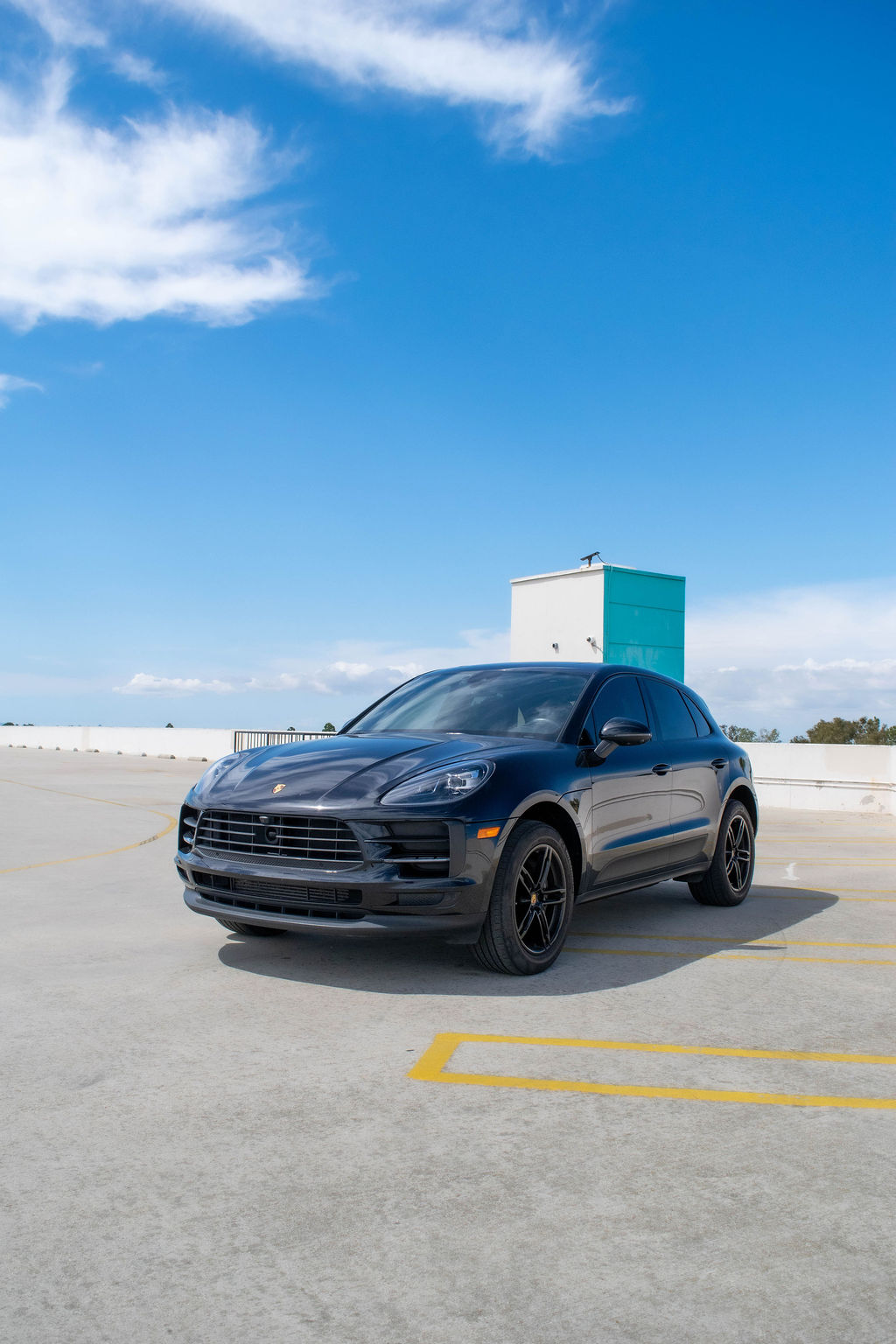 Porsche Macan rental in black, a 2.0 liter turbo four with a 7 speed automatic