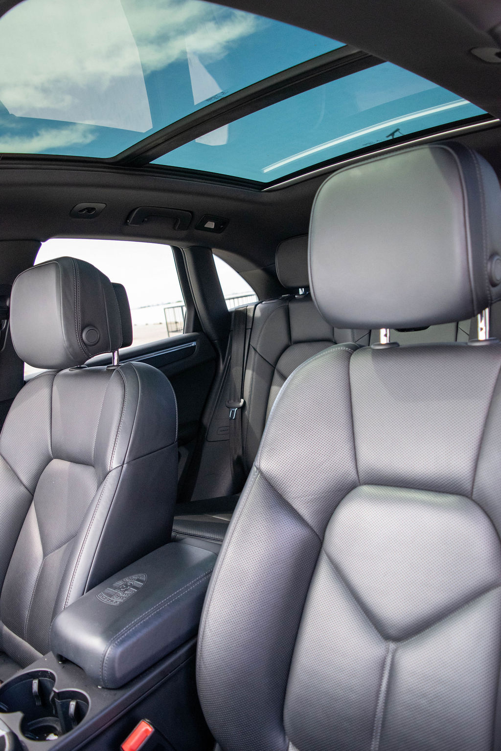 Porsche Macan rental, a 261 hp turbocharged compact SUV in black