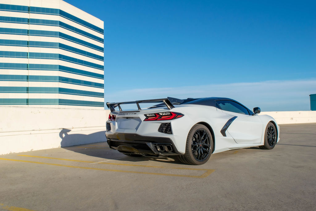 Chevrolet Corvette C8 rental in white, a 2 door coupe with a removable roof panel