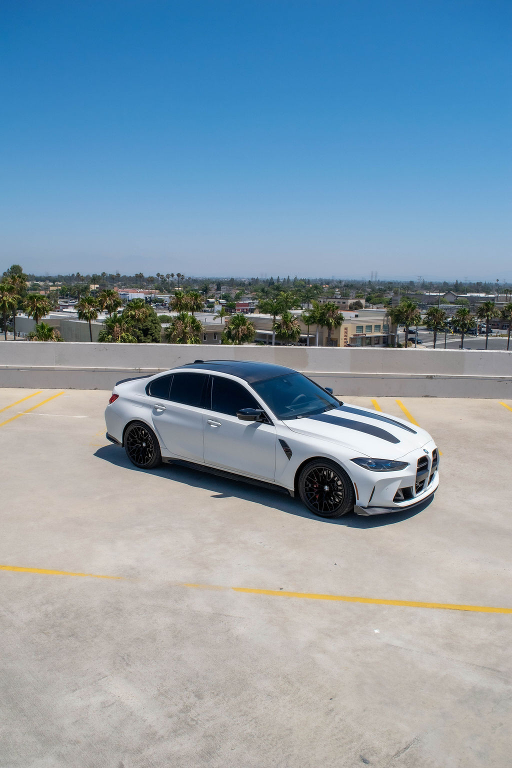 BMW M3 rental, a 4 door sports sedan seating 4