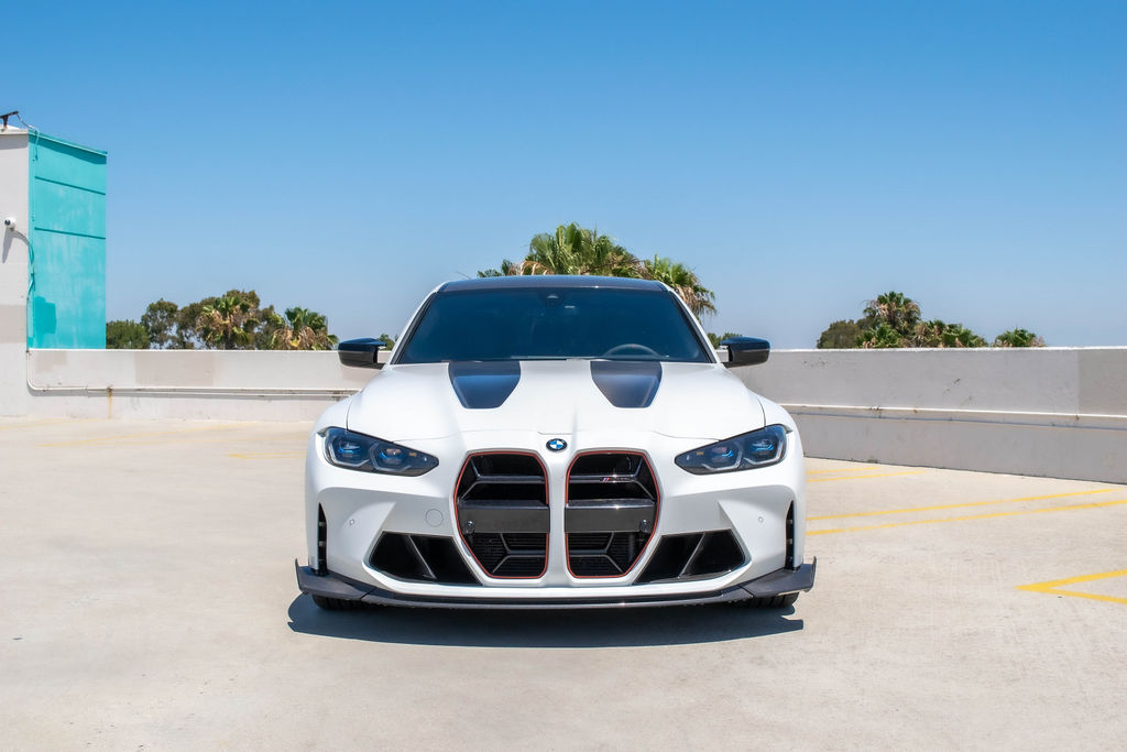 White BMW M3 rental with xDrive all-wheel drive