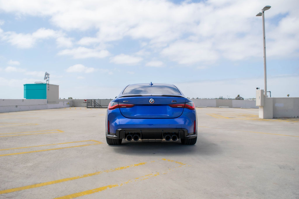 BMW M4 rental, a 503 hp twin-turbo inline-six coupe in blue