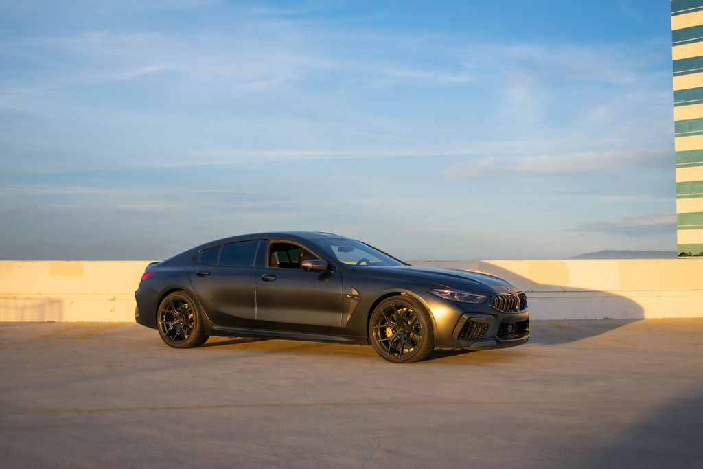 Satin black BMW M8, a 617 hp V8 grand tourer to rent in Southern California