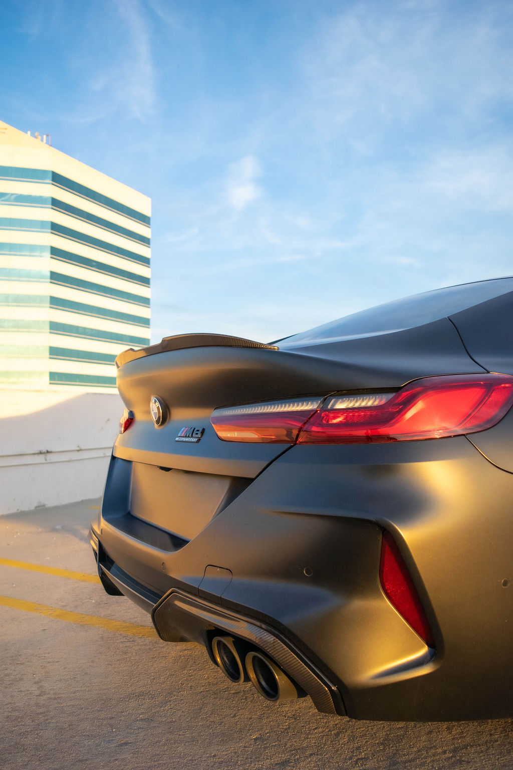 Satin black BMW M8 rental, sharing its 4.4 liter V8 with the M5