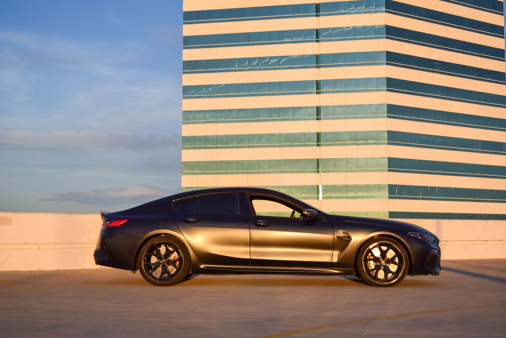 Satin black BMW M8 rental, an M grand tourer with an 8 speed automatic