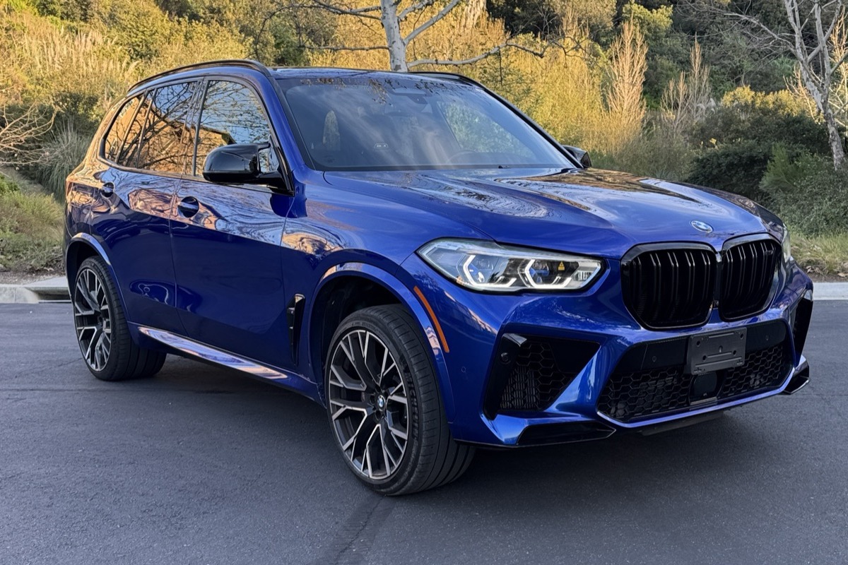 Blue BMW X5 M Competition front, rental in Orange County