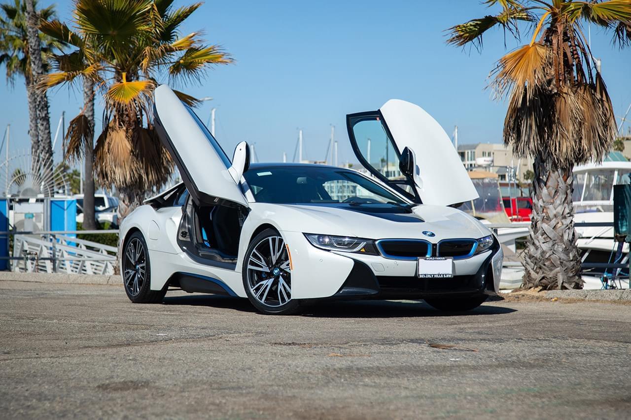 White BMW i8 with the doors open, rental in Los Angeles