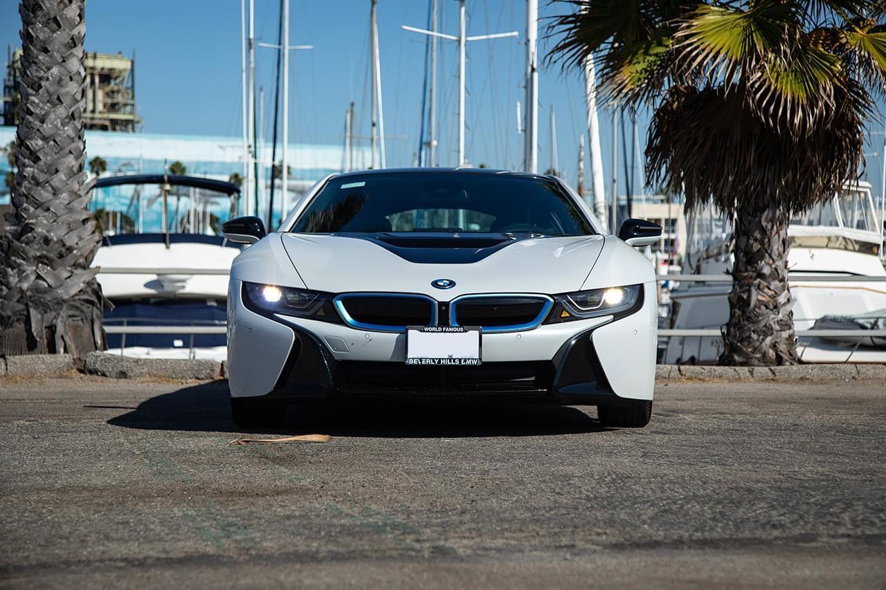 Front view of the white BMW i8 rental, a carbon tubbed plug-in hybrid coupe