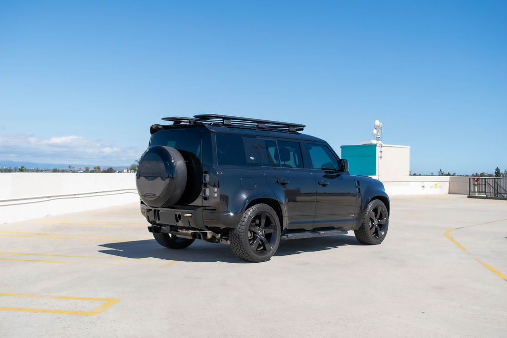 Land Rover Defender rental, a 395 hp turbocharged inline-six SUV in black