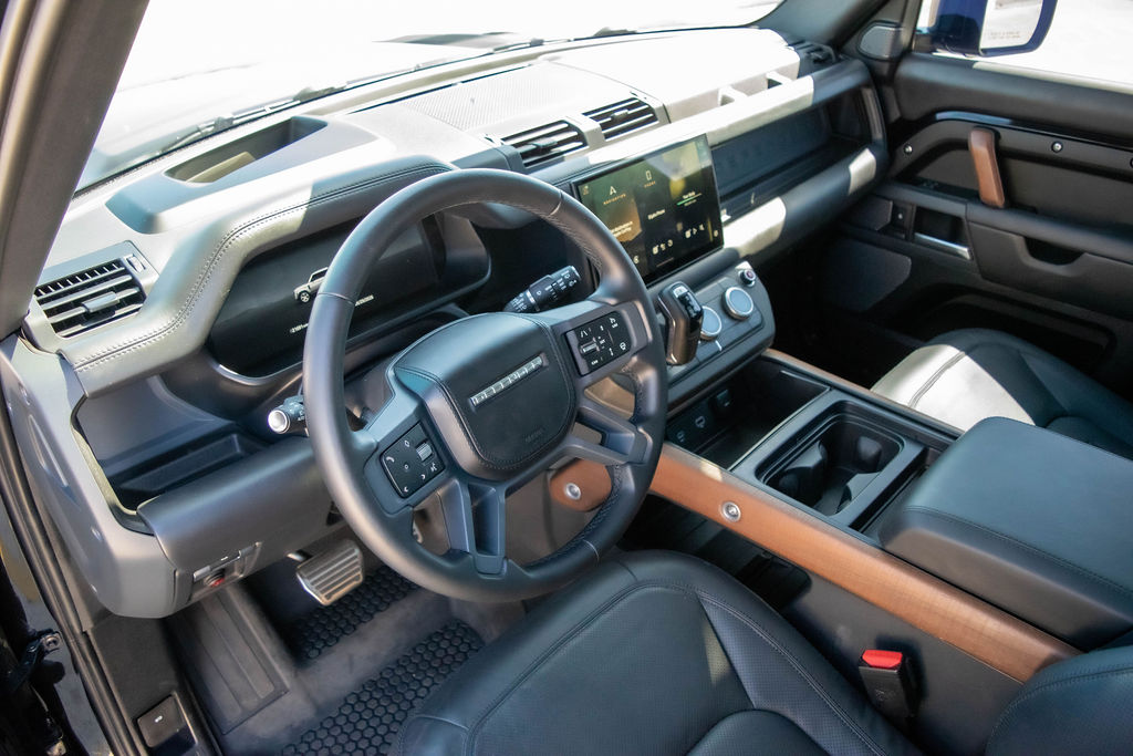 Land Rover Defender rental in black, with a 900mm wading depth