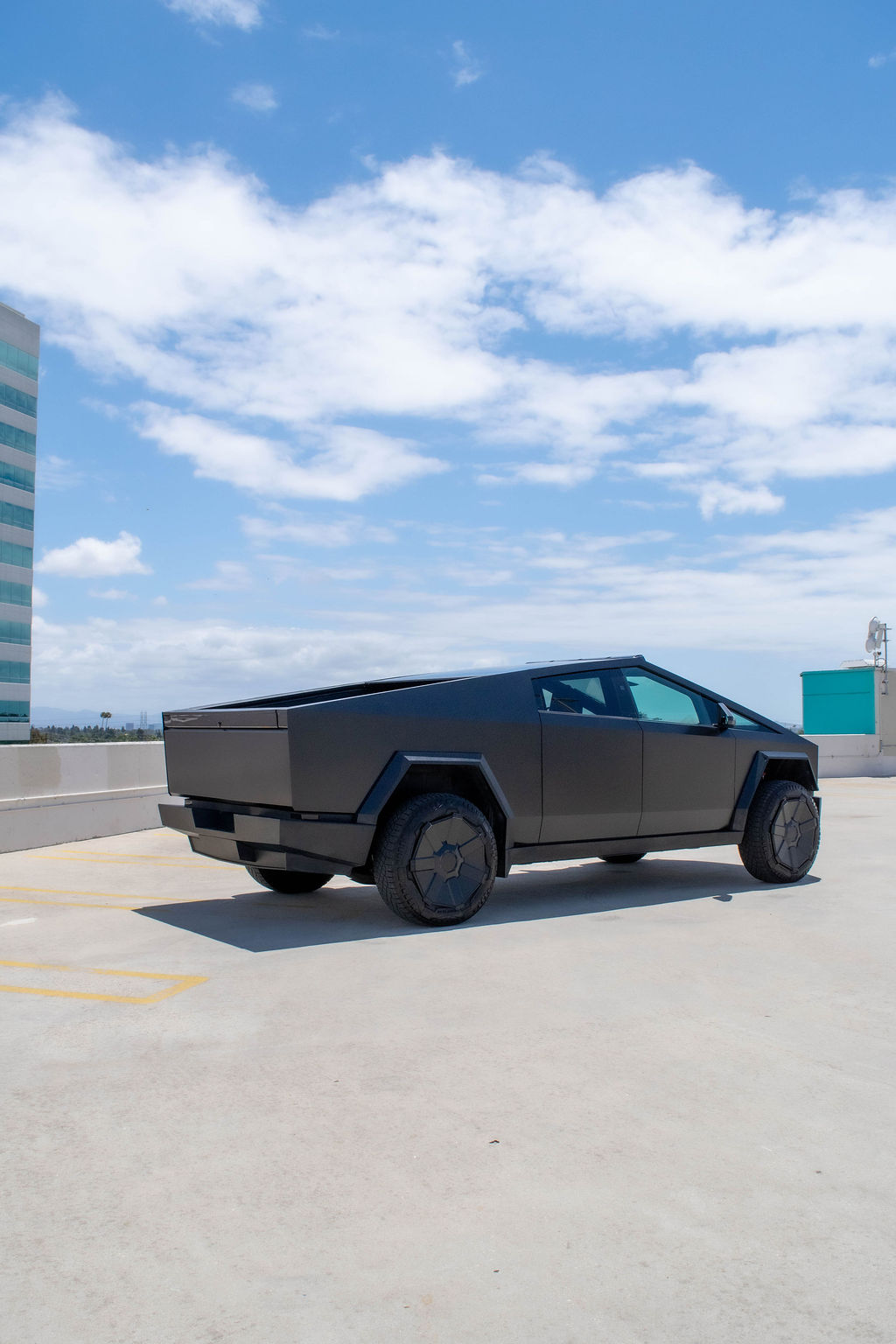 Tesla Cybertruck rental, a 600 hp dual motor electric pickup in black