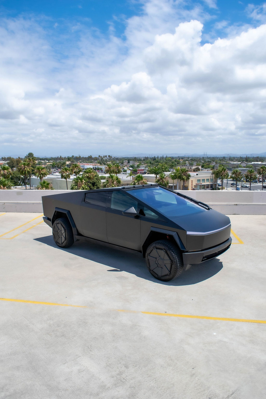 Black Tesla Cybertruck rental, a 5 seat pickup with all-wheel drive