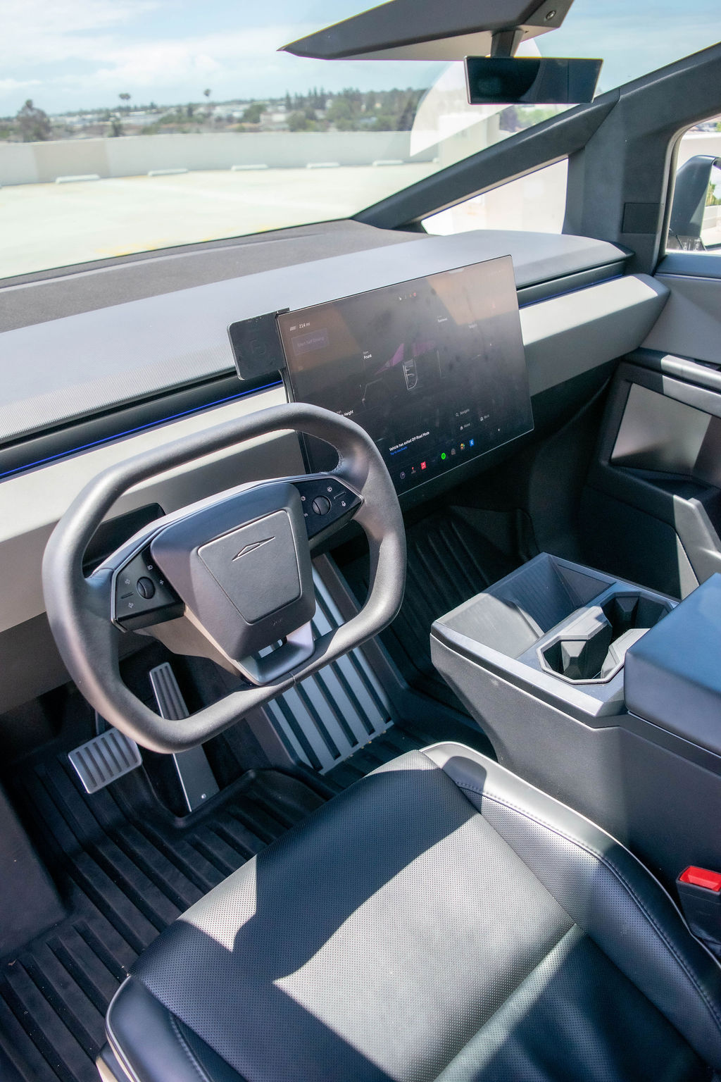 Tesla Cybertruck rental, a 4 door electric pickup with steer-by-wire steering