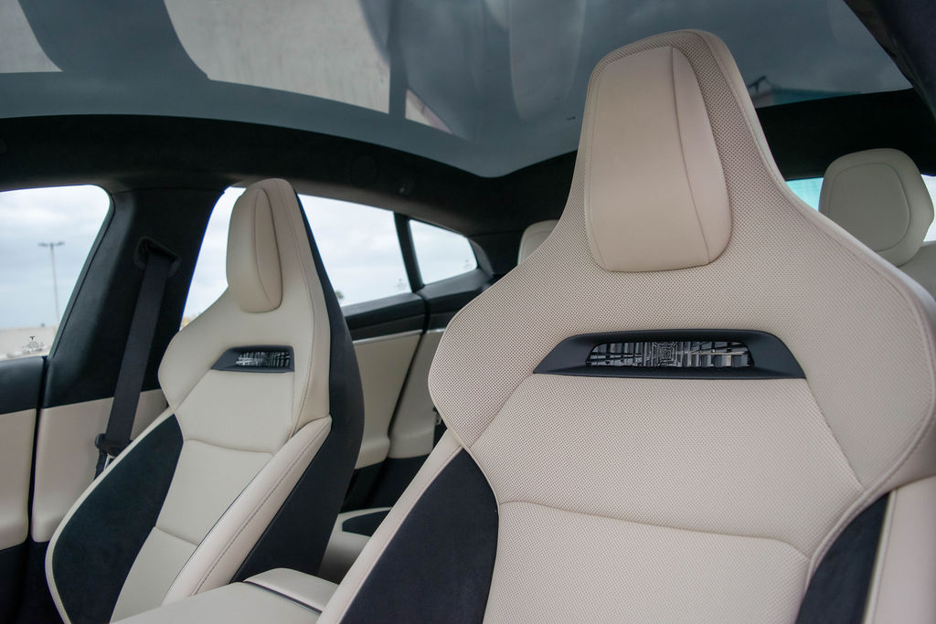 Red Tesla Model S rental, a 5 seat electric sedan with all-wheel drive