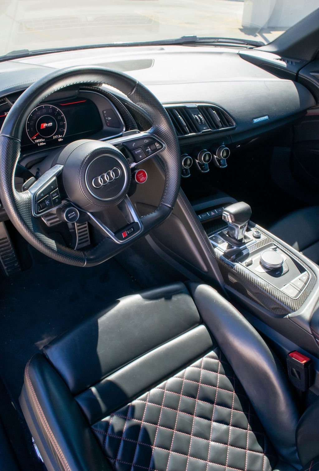 Audi R8 rental in white, the V10 supercar Audi built to be driven every day