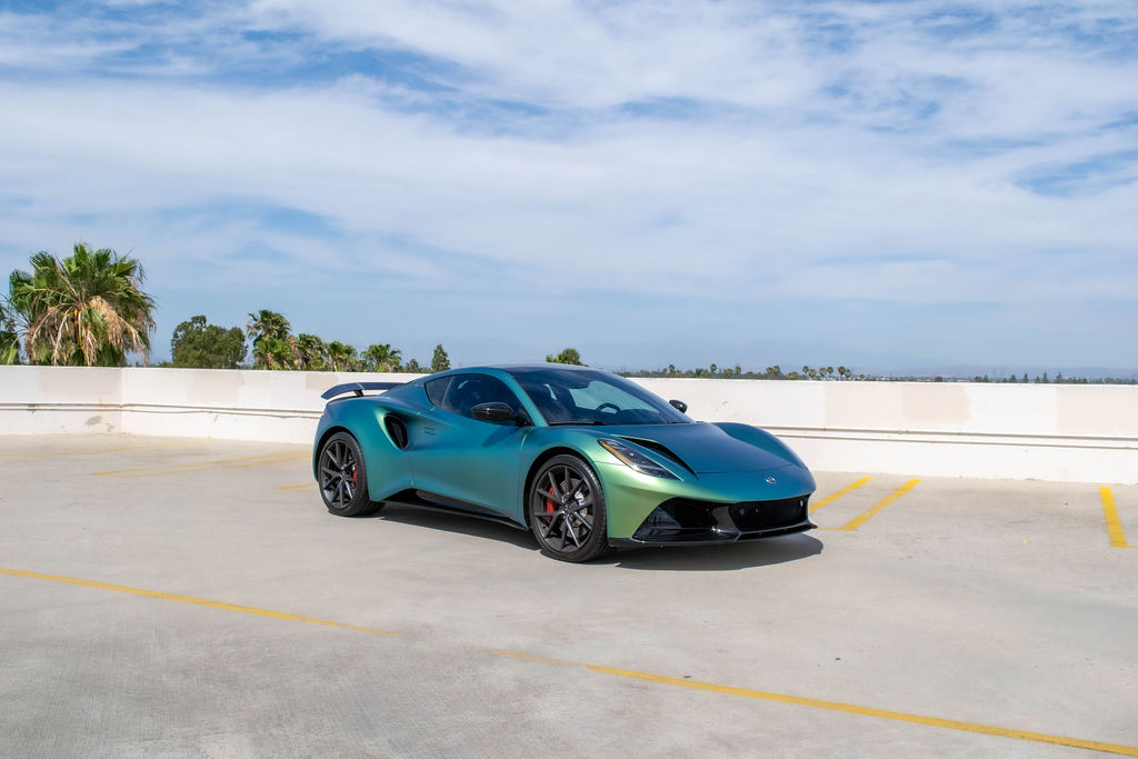 Green Lotus Emira, a mid-engined supercharged V6 to rent in Southern California