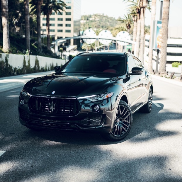 Front view of the black Maserati Levante S rental, a 424 hp twin-turbo V6 SUV
