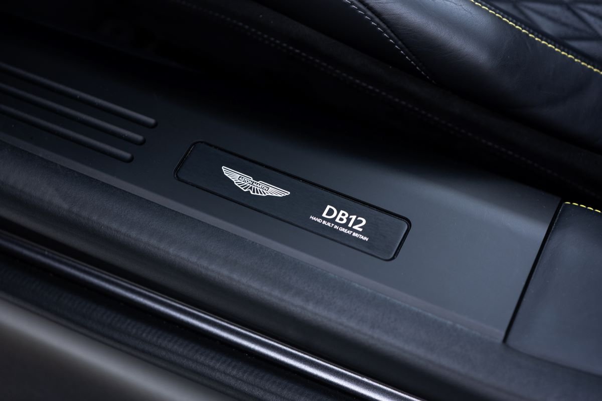 Badge on the grey Aston Martin DB12 Volante rental, a 671 hp V8 grand tourer