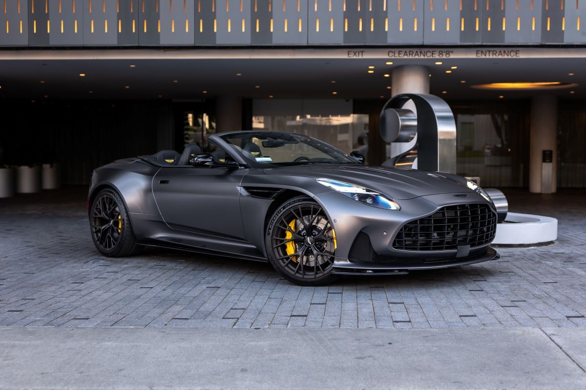 Front view of the grey Aston Martin DB12 Volante rental, rear-wheel drive V8