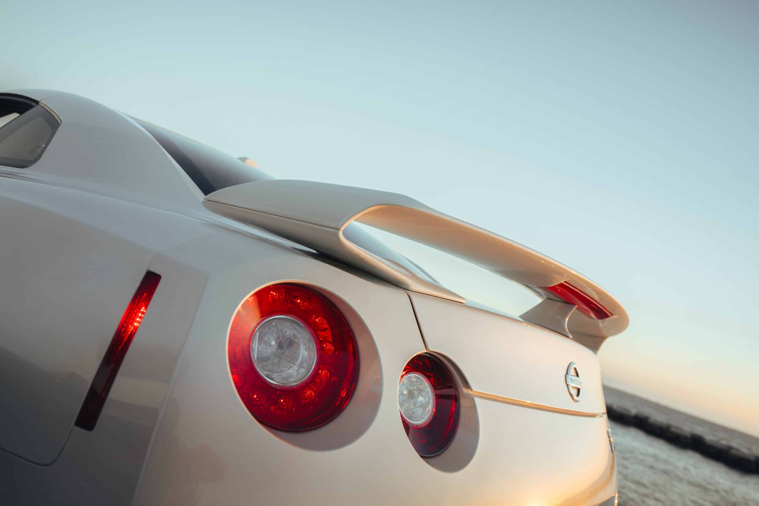 White Nissan GT-R rear view, AWD Sports Car rental