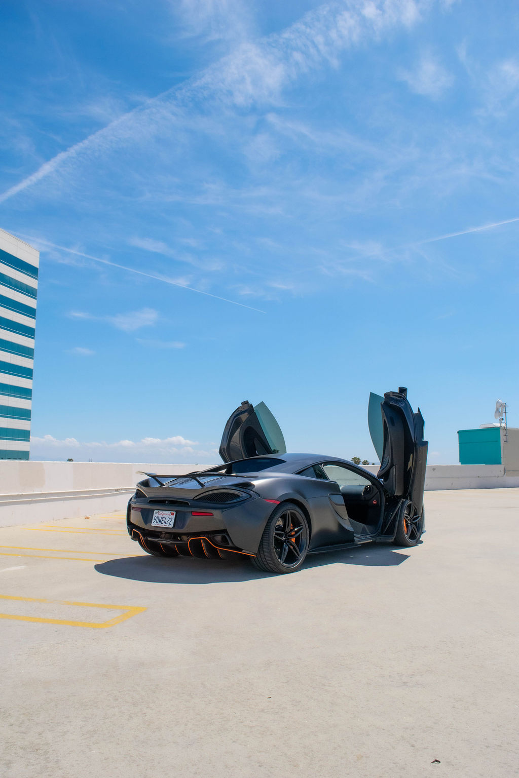 Black McLaren 570S, 2 seats, RWD