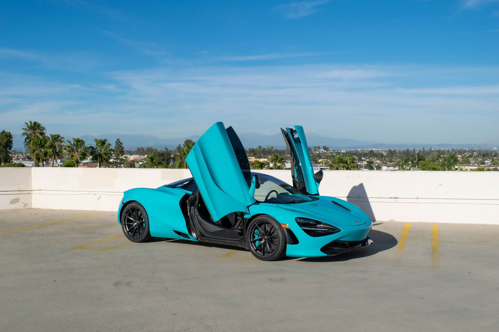 Turquoise McLaren 720S MSO rental in Orange County, Black interior