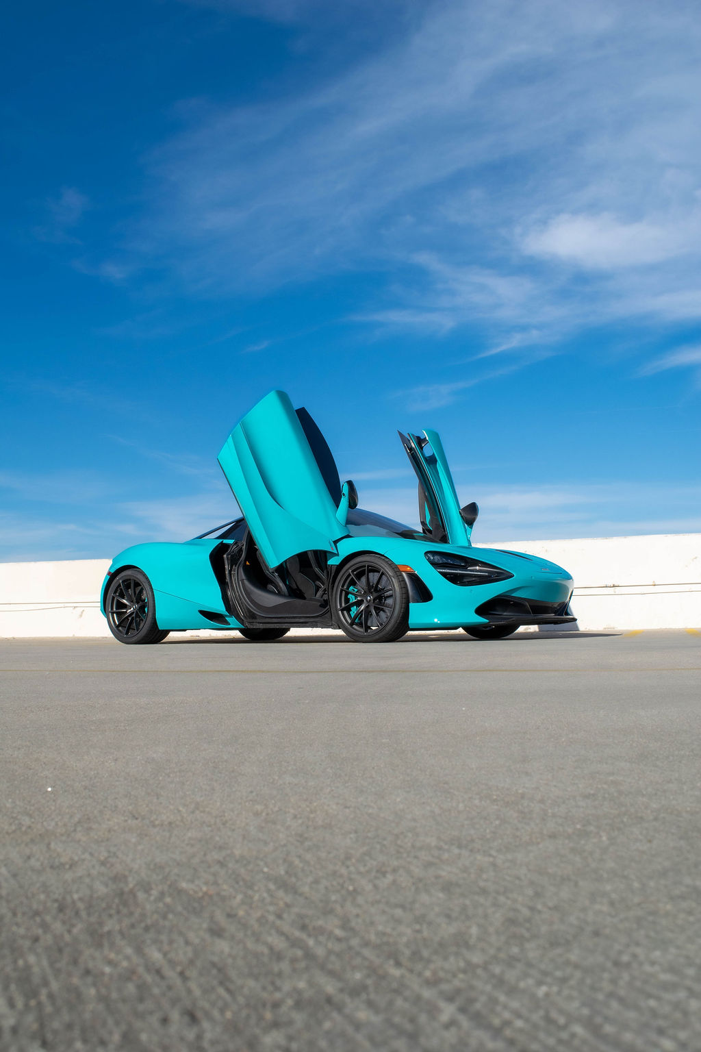 Turquoise McLaren 720S MSO, exotic car rental in Orange County