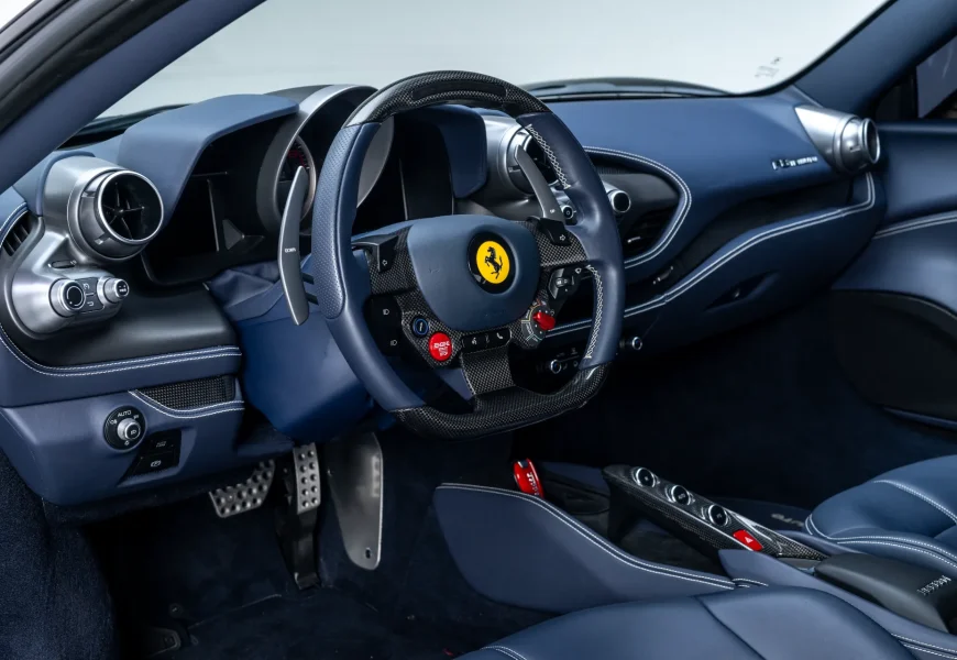 Black Ferrari F8 Tributo steering wheel, supercar for rent in Los Angeles