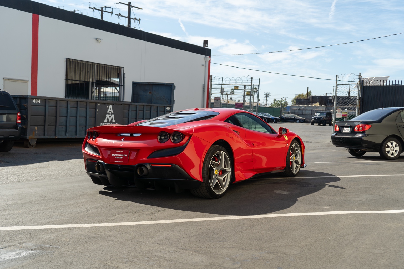 Red Ferrari F8 Tributo supercar for rent in Orange County, Black and Red interior