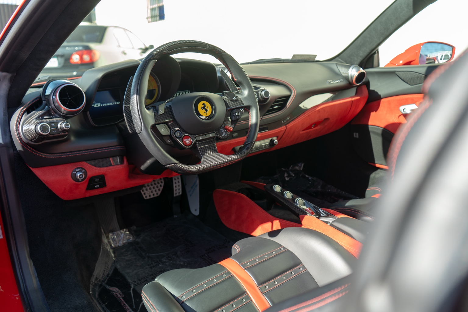 Red Ferrari F8 Tributo supercar with Black and Red interior