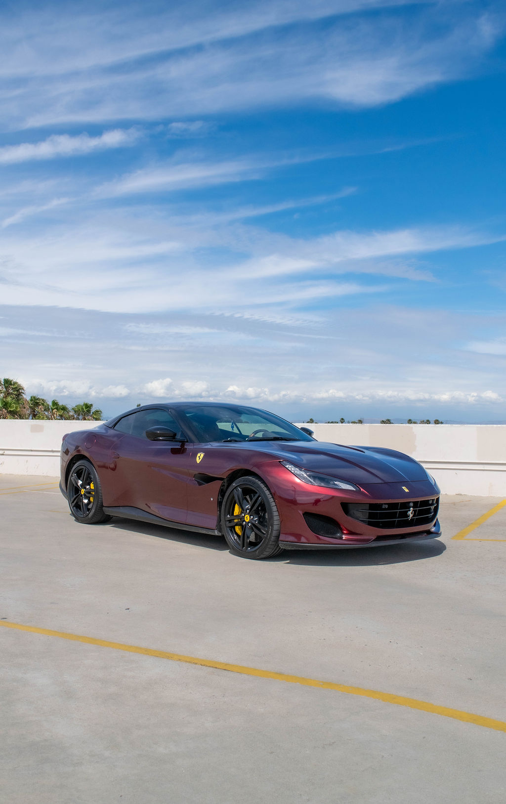 Burgundy Ferrari Portofino Spider RWD supercar with Tan interior