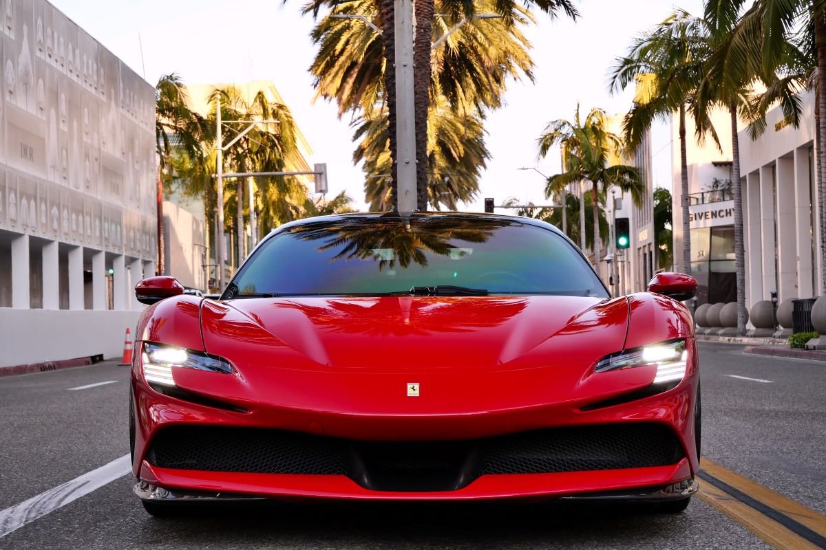 Red Ferrari SF90 Stradale front view, 2 seat hypercar