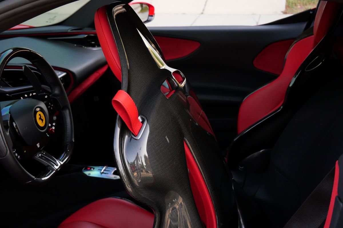 Red Ferrari SF90 Stradale door open
