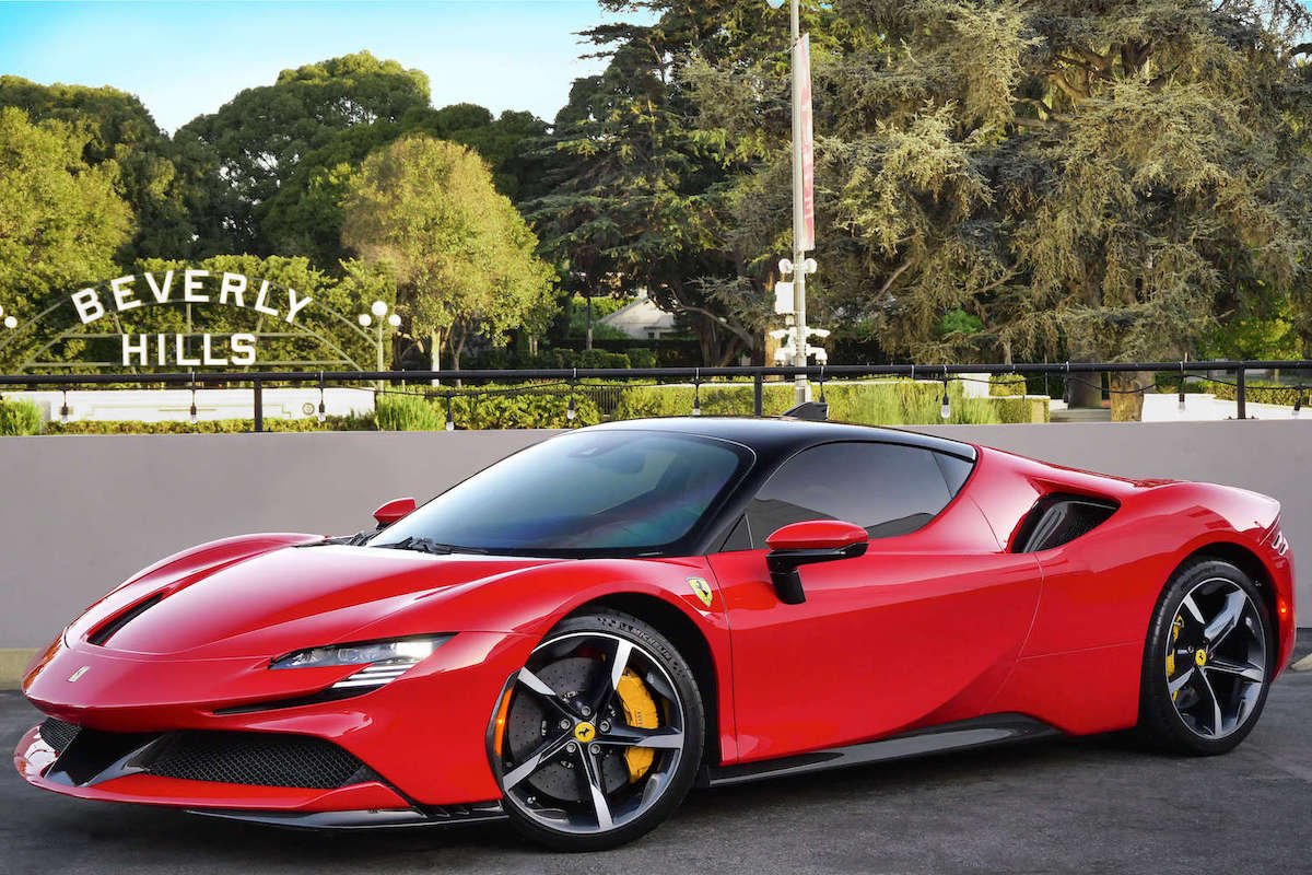 Red Ferrari SF90 Stradale front view, AWD hypercar rental in Los Angeles